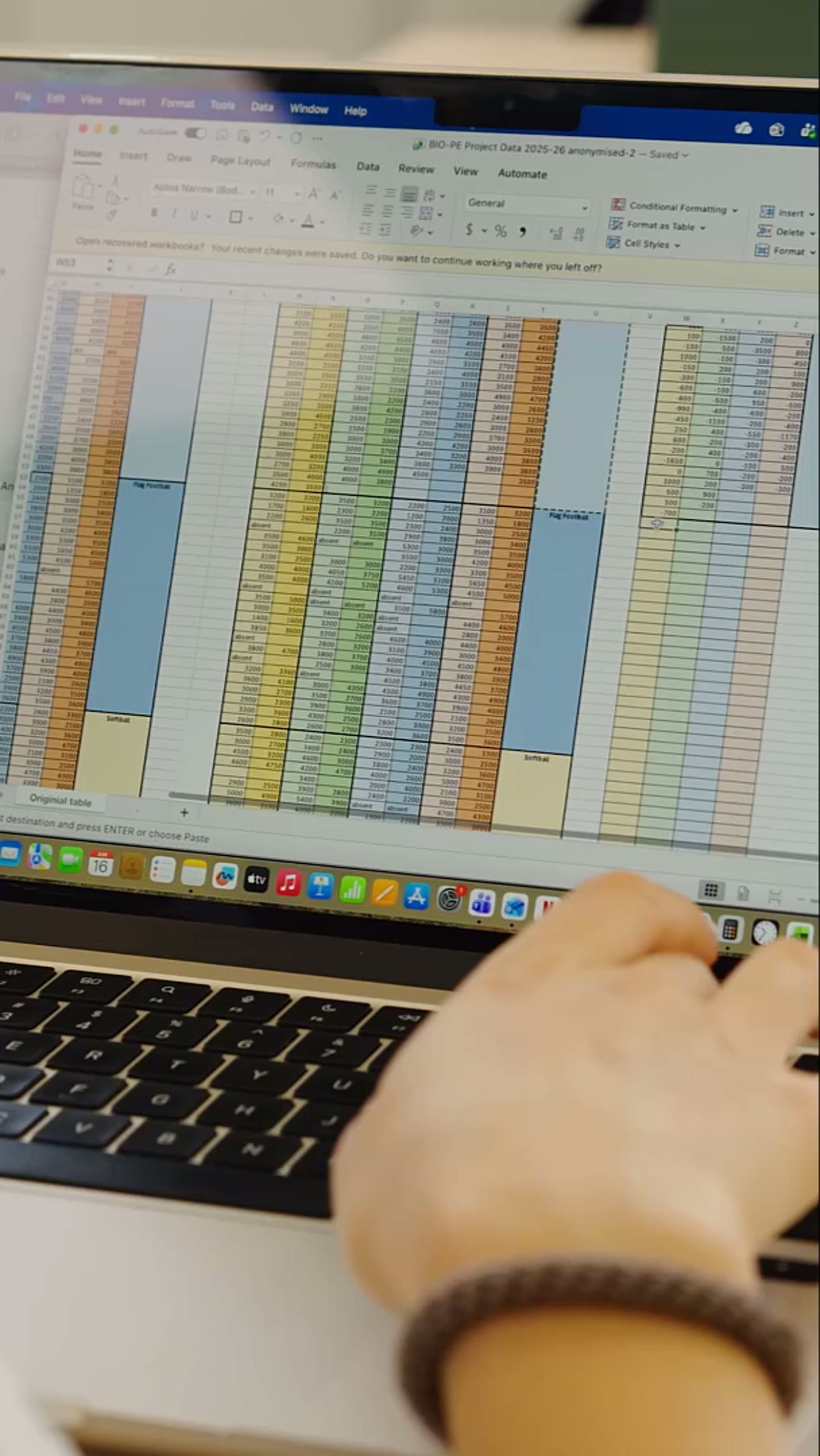 A student working on the data behind her own research project