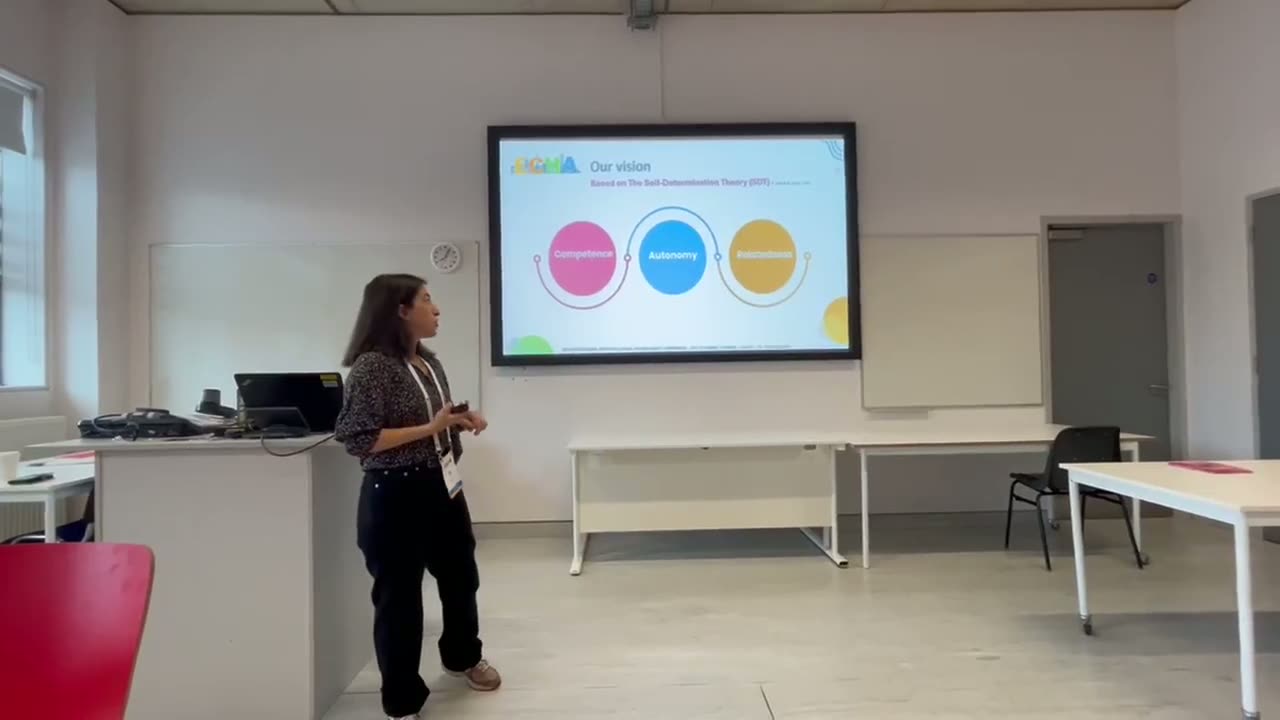 A speaker presenting to a Limitless group during a monthly theme session