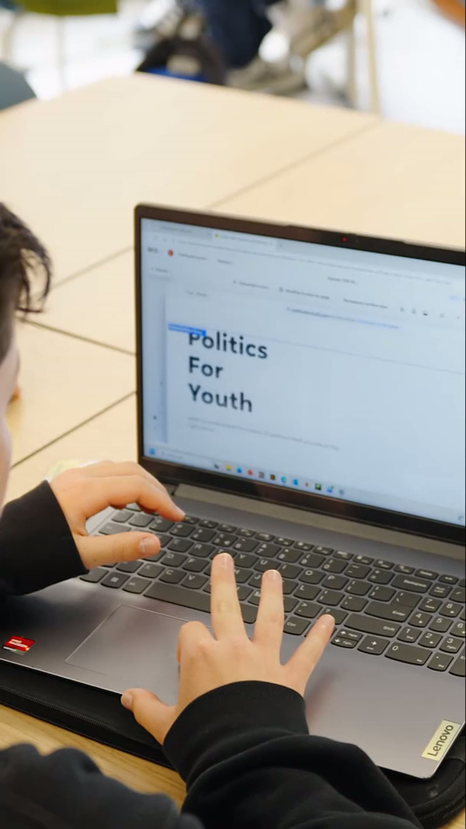 A student building a website to teach young people the basics of politics